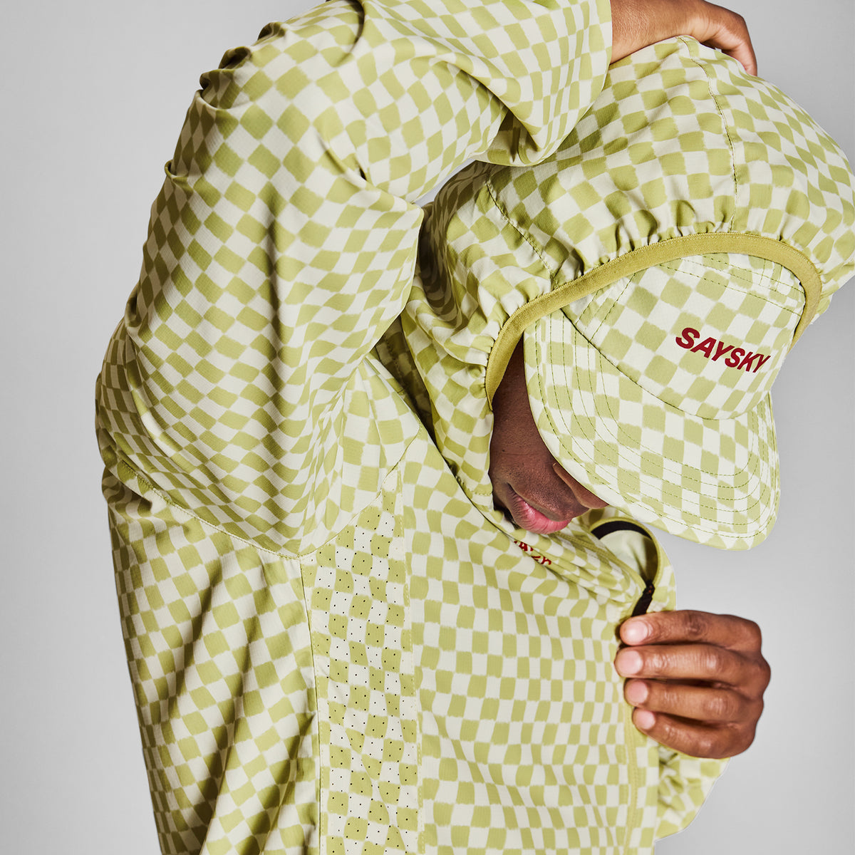 ランニングジャケット NMRJA22c1034 Checker Pace Jacket - Green Checker Aop [メンズ]