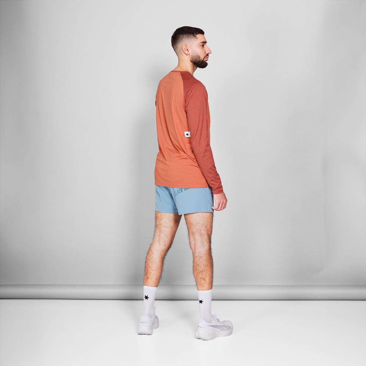 ランニングTシャツ（ロングスリーブ） NMRLS21c5005 Logo Pace Long Sleeve - Red Melange [メンズ]