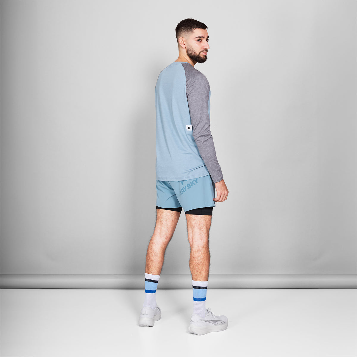 ランニングTシャツ（ロングスリーブ） NMRLS21c2010 Logo Pace Long Sleeve - Blue Melange [メンズ]
