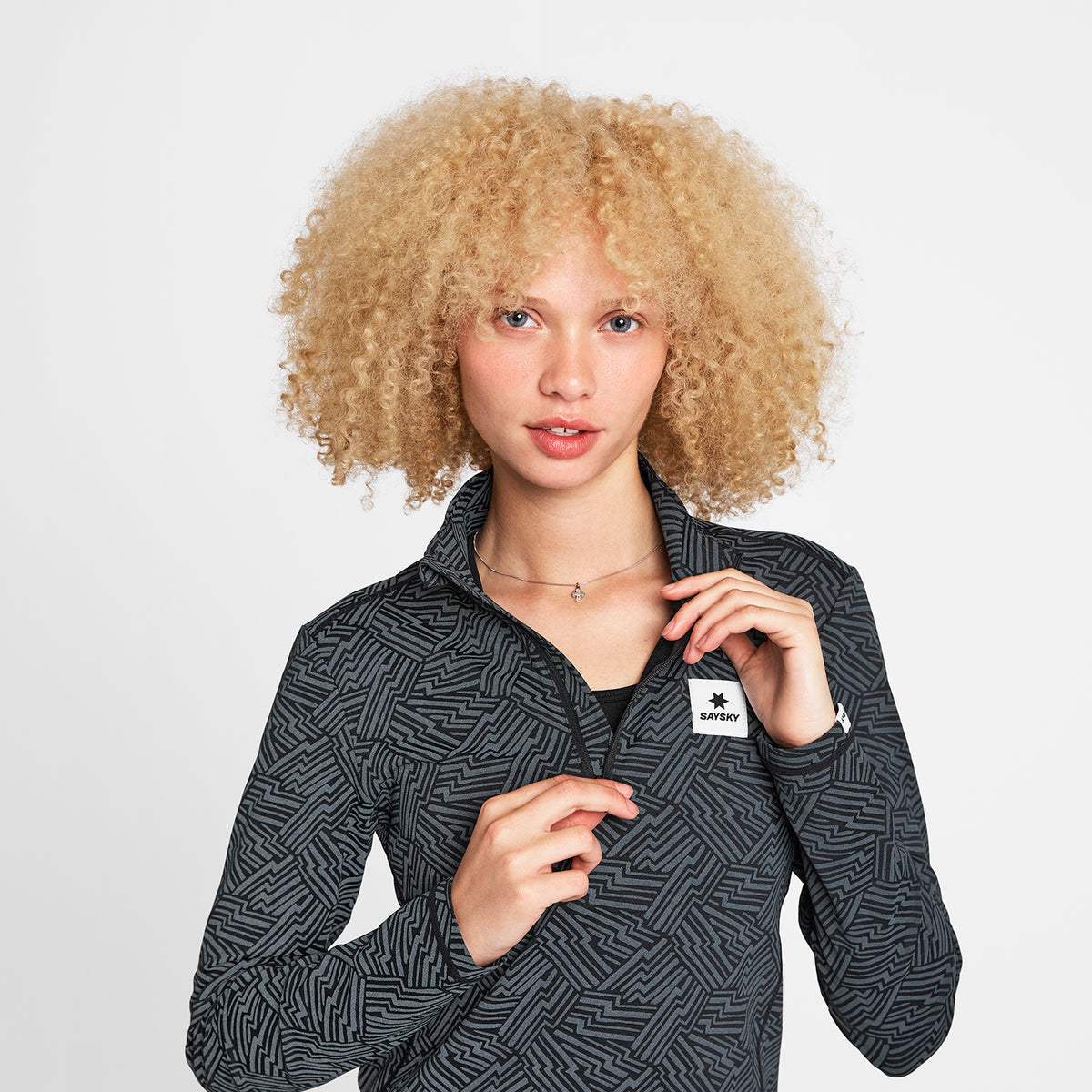 ランニングTシャツ（ロングスリーブ） OWRLS21c1050 Wmns Reflective Pace 1/2 Zip Long Sleeve - Black Aop [レディーズ]